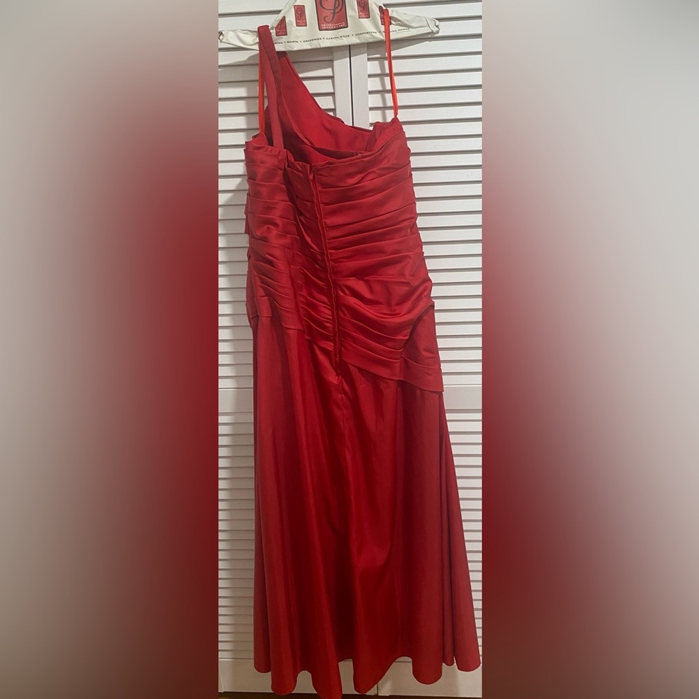 Red Prom, wedding and or cocktail dress and size is a 10.